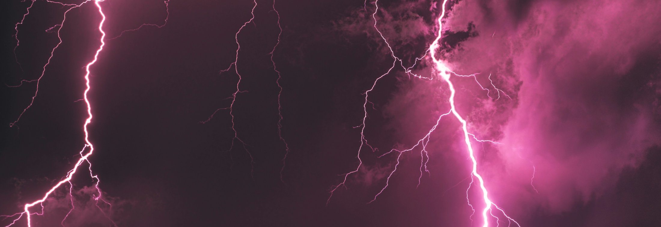 Purple sky filled with lightning