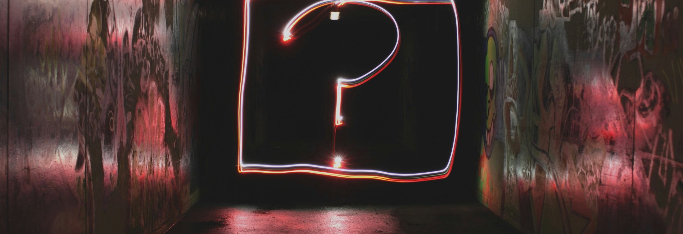 Neon sign with question mark